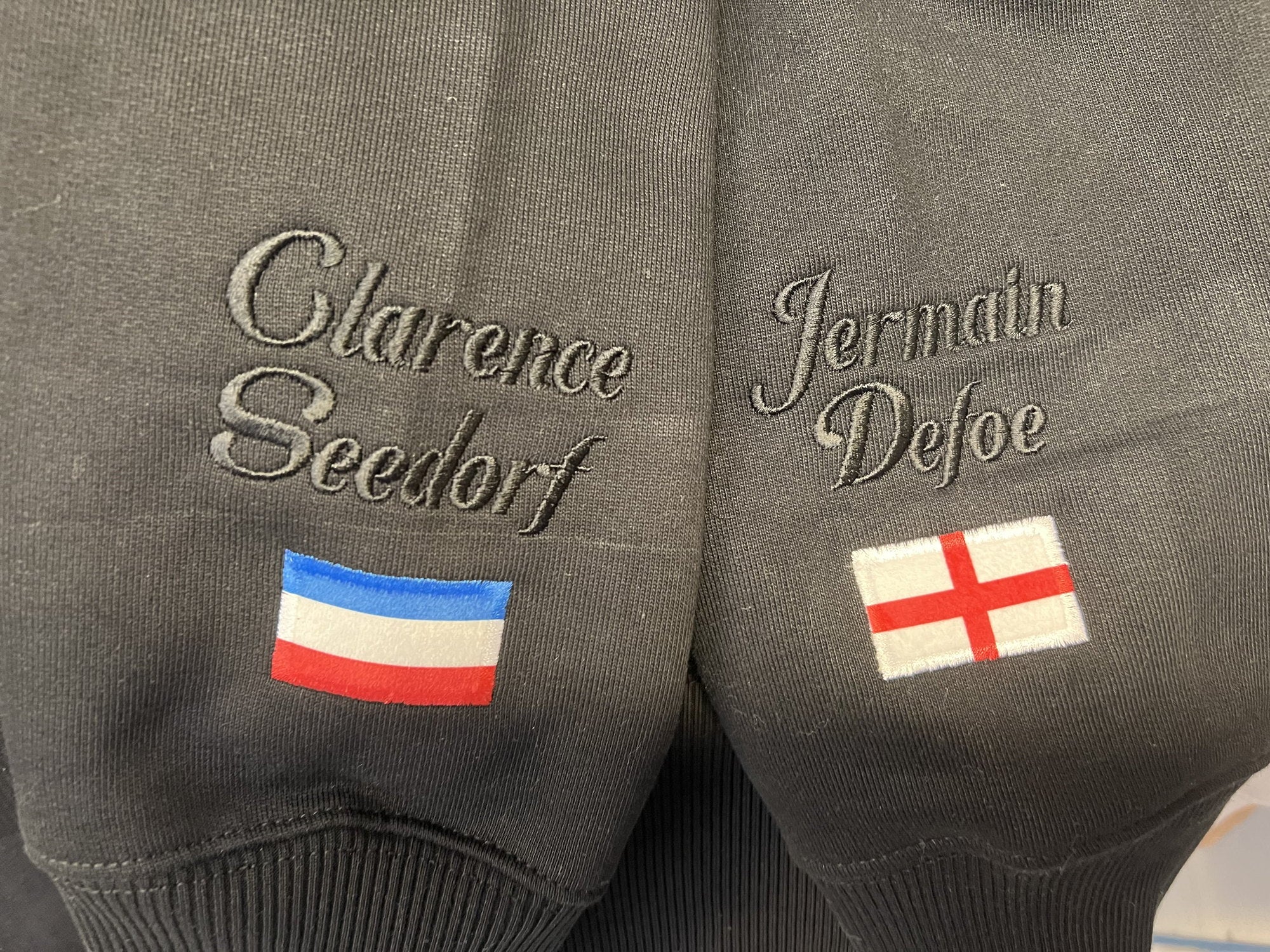 Clarence Seedorf and Jermain Defoe embroidered cuffs