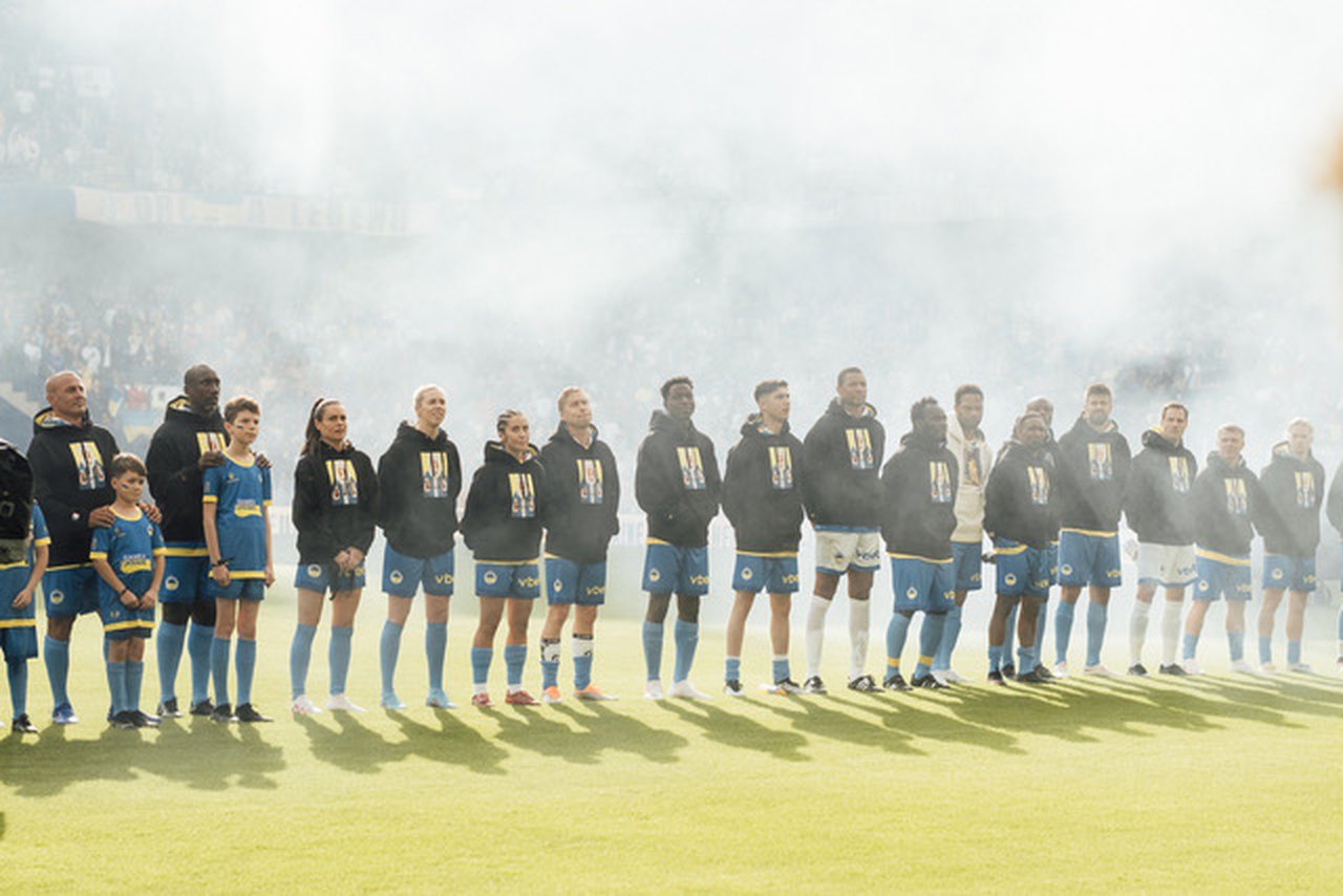 Players in Rules of Faith hoods before kick-off